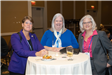 Three women enjoying the Women in Municipal Government Networking & Awards Event