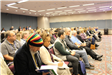 Audience members at Conference session